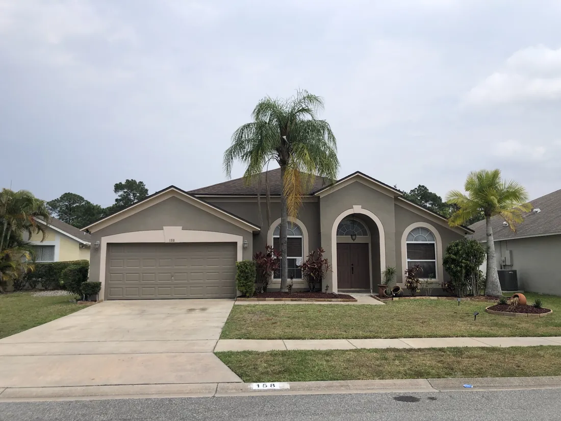 Front view of a Central Florida home with a new shingle roof