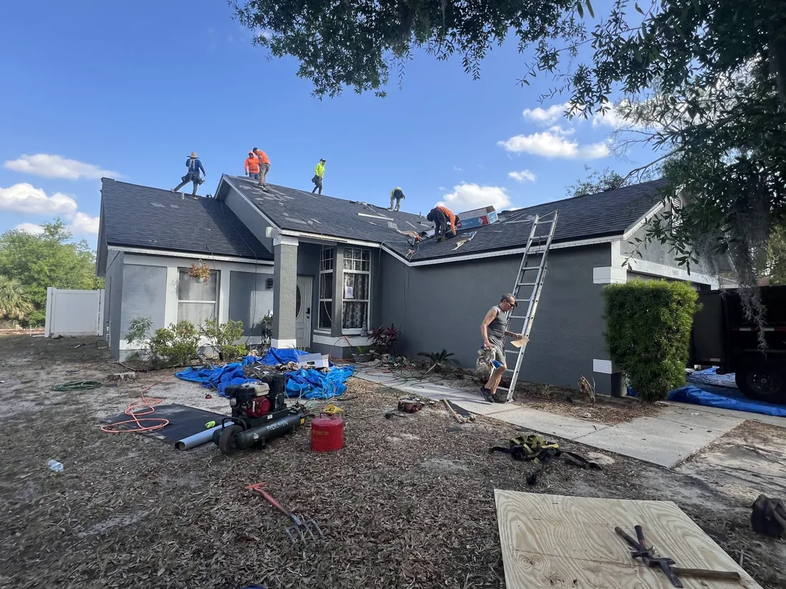 Icon Roofing crew tearing off and replacing a shingle roof