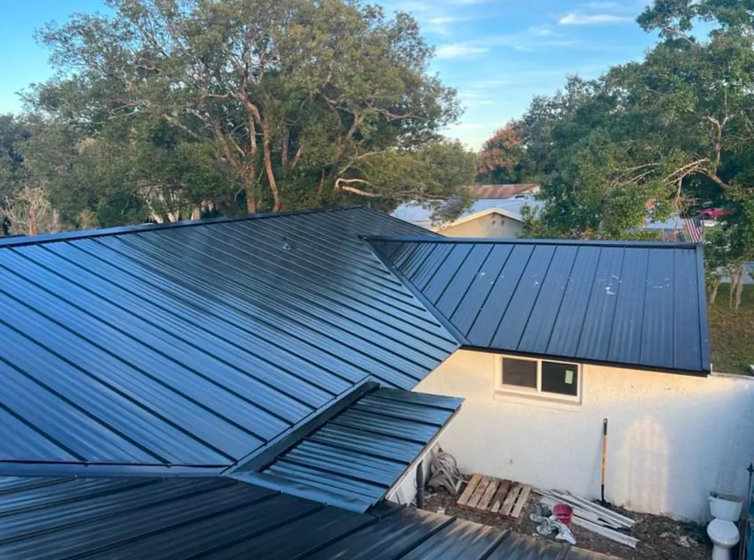 Black standing seam metal roof installed by Icon Roofing Group in Central Florida