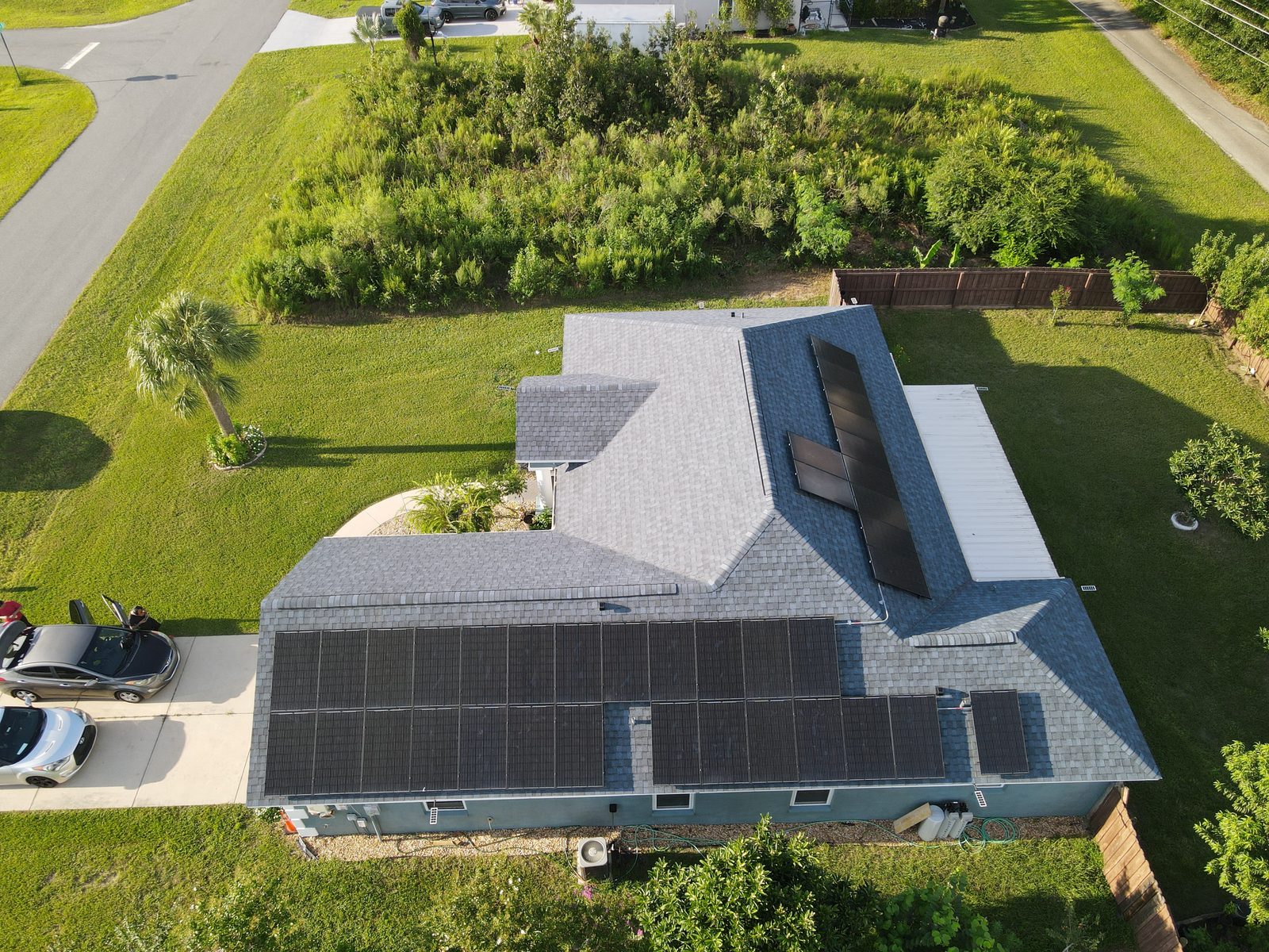 Aerial drone photo of a Central Florida home with newly installed solar panels