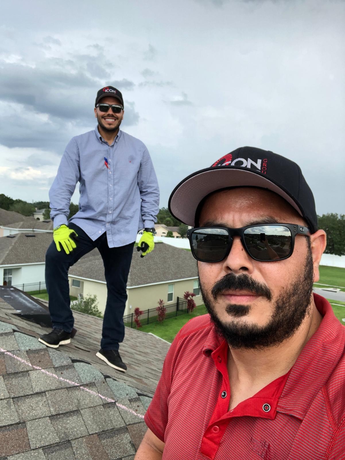 Icon Roofing Group team members on a completed roof, Orlando