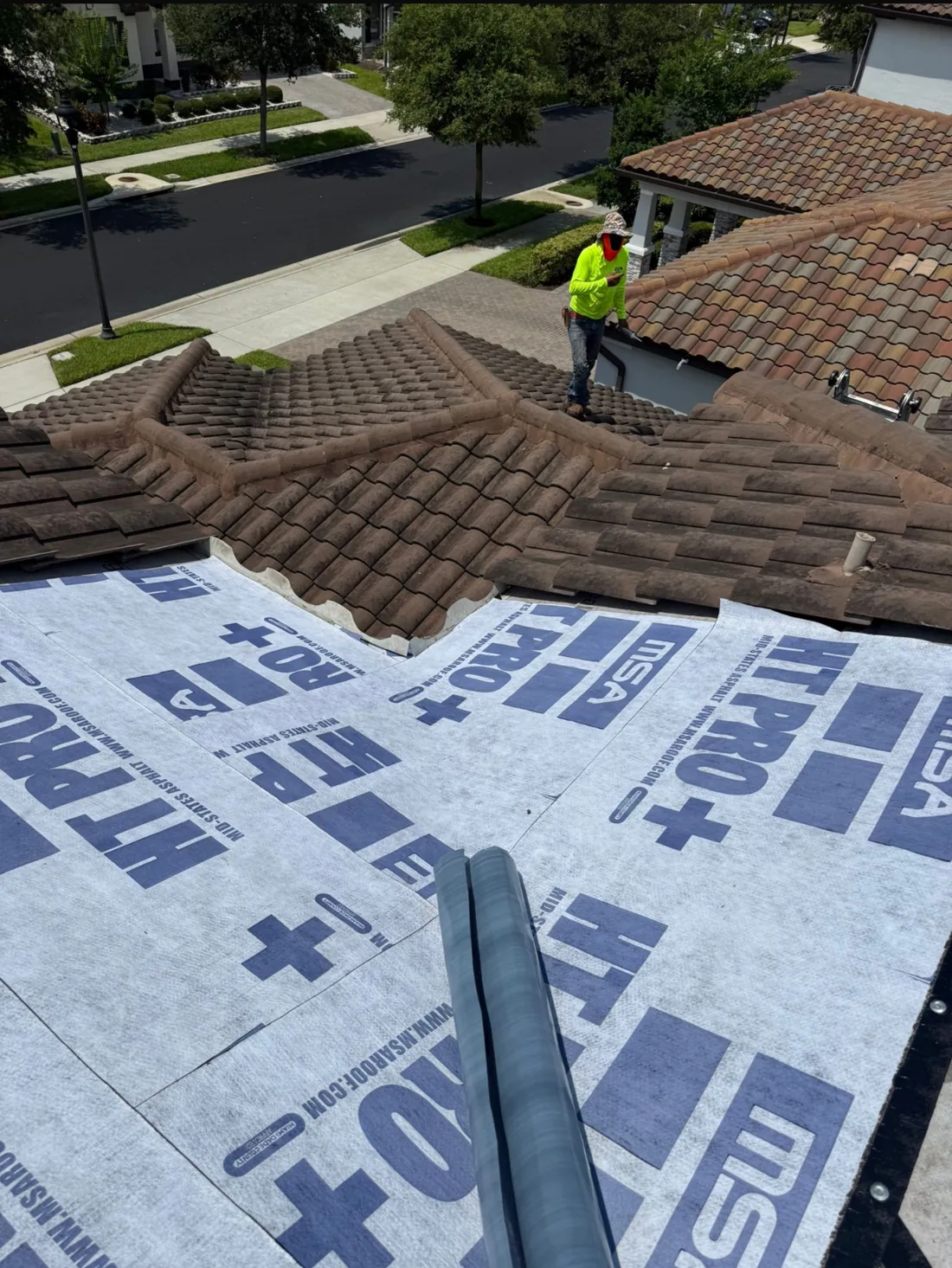 Tile roof replacement in progress with new underlayment, Central Florida