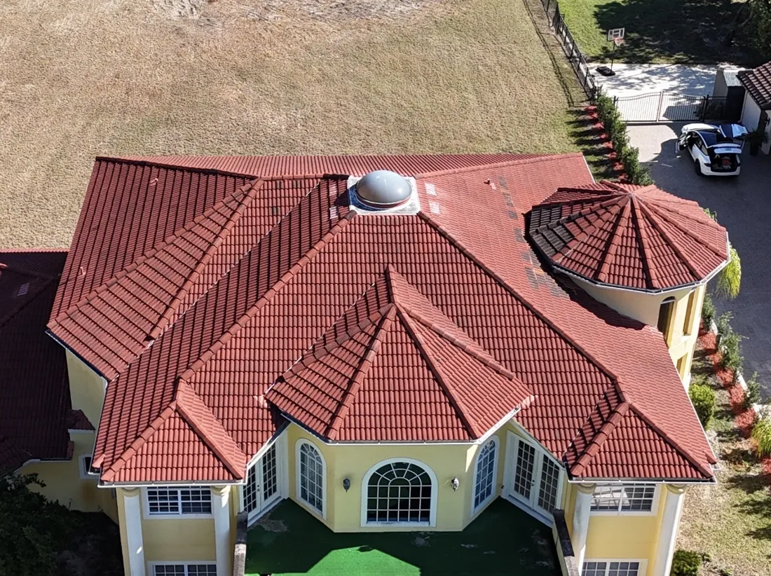 Aerial view of a red tile roof on a Central Florida home